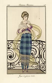 Images Dated 10th April 2019: Woman in a large toile skirt, looking afraid of a spider