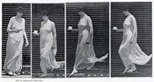 Woman in a long dress carrying a cup and saucer Date: 1887