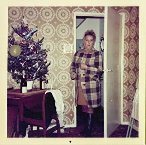 Seventy Prints: Woman looks surprised entering room decorated for Christmas