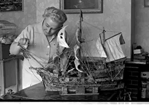 Hobby Prints: Woman with model ship made of matchsticks