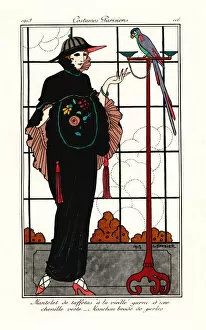 Woman in an old-taffeta cape with a parrot, 1913