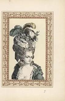 Woman in the Oriental hairstyle with hat decorated