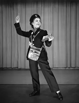 Props Prints: Woman performing as a bus conductor in a comic sketch