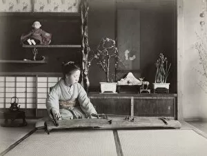 Lifestyle Collection: Woman playing koto stringed musical instrument, Japan