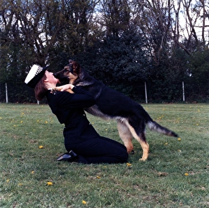 Amanda Gallery: Woman police dog handler with dog, London