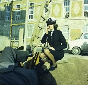 Policewoman Gallery: Woman police officer attending an accident