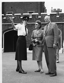 Sunglasses Prints: Woman police officer with couple, London