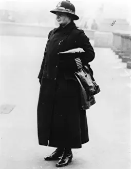 Woman police officer on duty, London