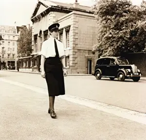 Woman police officer on duty, London