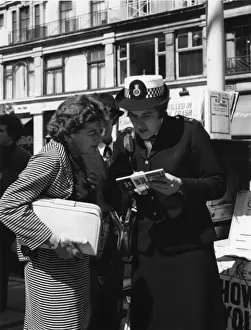 Woman police officer on duty in London