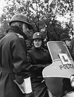 Policewomen Gallery: Woman police officer with motorcycle, Hendon, London
