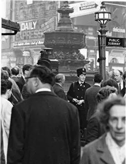 Adverts Gallery: Woman police officer at Piccadilly Circus, London