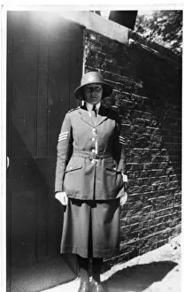 Buttoned Collection: Woman police officer posing in uniform, London, WW2