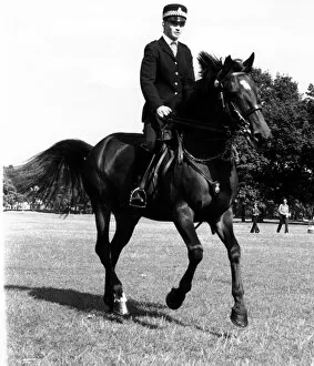 Equality Gallery: Woman police officer riding horse, London