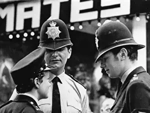 Woman police officer in street, London