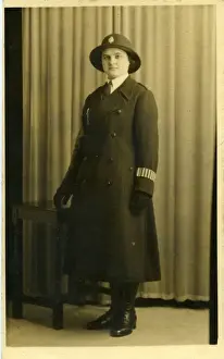 Woman police officer in studio photo