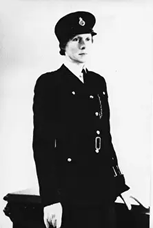 Woman police officer in studio photo