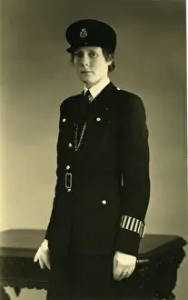Woman police officer in studio photo