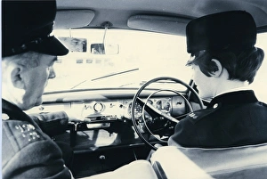 Woman police officer undergoing driving training Woman police officer undergoing driving training