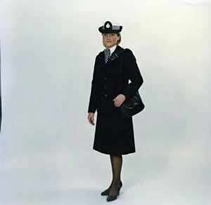 Buttons Collection: Woman police officer in updated uniform, London