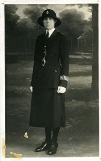 Buttoned Collection: Woman police officer W Gould in uniform, London