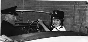 Topped Prints: Woman police officer at the wheel of a car, London
