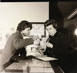 Woman police officer working at a police station