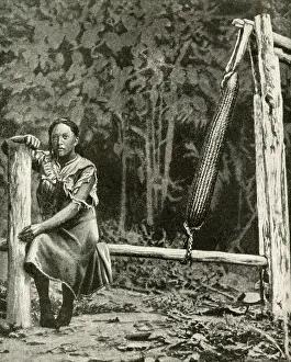 Images Dated 31st July 2018: Woman preparing food from cassava plant, Brazil