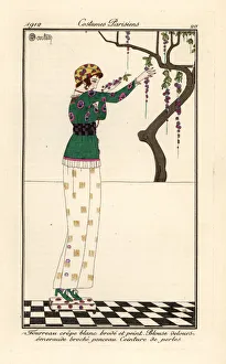 Images Dated 12th April 2019: Woman in a printed and embroidered sheath dress