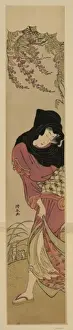 Wisteria Prints: Woman protecting herself against the wind beneath wisteria b