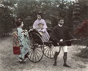 Rickshaw Collection: Woman being pulled in rickshaw, jinrikisha, Japan