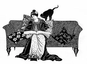 Images Dated 3rd April 2017: Woman reading with cat