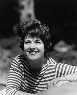 Images Dated 18th November 2016: Woman relaxing in stripy top