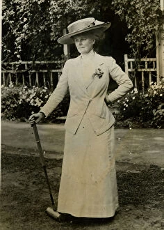 Mallet Gallery: Woman resting during a game of croquet