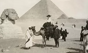 Sphinx Gallery: Woman riding a camel in Giza, Egypt