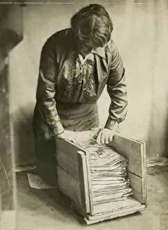 Responsible Collection: Woman saving paper during WW1