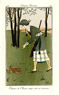 Fleurs Collection: Woman with shotgun in hunting outfit of green