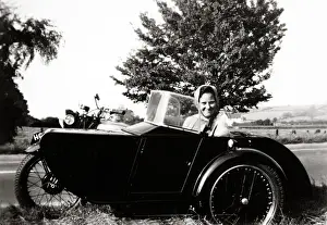 Woman in sidecar of 1938 BSA motorcycle