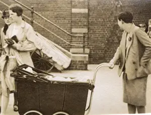 Perambulator Prints: Woman in smart summer suit pushing a perambulator