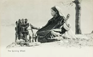Woman spinning - India