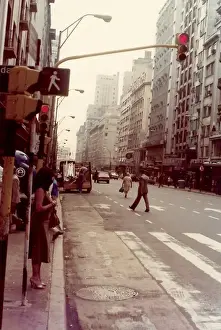 Buenos Prints: Woman standing at pedestrian crossing