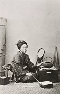 Woman at a stove, Japan