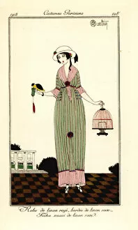 Shotgun Gallery: Woman in striped linen dress holding a bird and cage, 1913