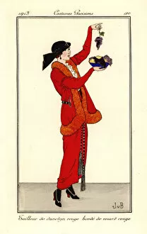 Woman in suit of red duvetyn with red fox fur trim