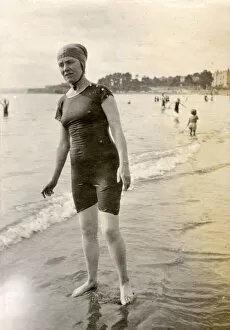Images Dated 31st October 2018: Woman in a swimming costume on the beach at the seaside