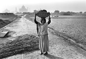 Agra Gallery: Woman and Taj Mahal, India