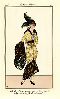 Satin Gallery: Woman in topaz satin dress trimmed with leopard fur, 1913