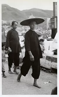 Images Dated 19th May 2017: Woman in traditional hat - Hong Kong, China