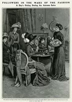 Choosing Gallery: Woman trying on an array of hats in the Autumn sale 1909