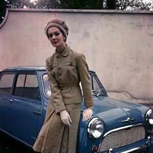 Images Dated 13th January 2016: Woman in tweed suit posting with car
